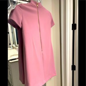 Designer dress never worn. Great for a wedding or any occasion